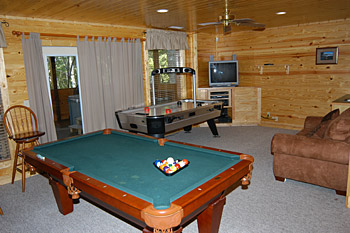 gameroom with pool table and Surround Sound Theatre